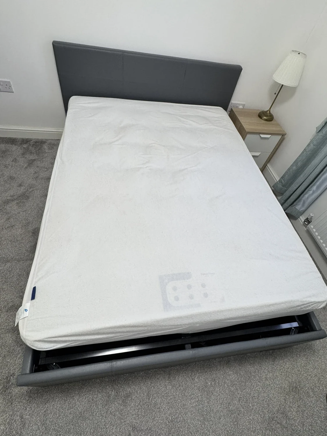 Grey leather ottoman double bed with mattress