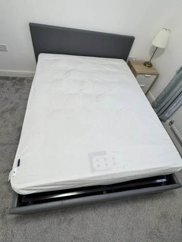 Grey leather ottoman double bed with mattress