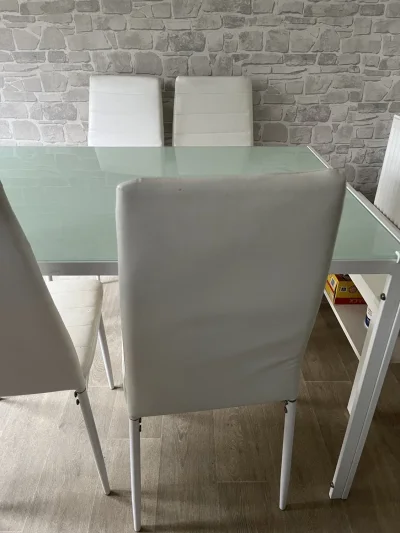 Modern Glass-Top Dining Table with White Chairs — image 6