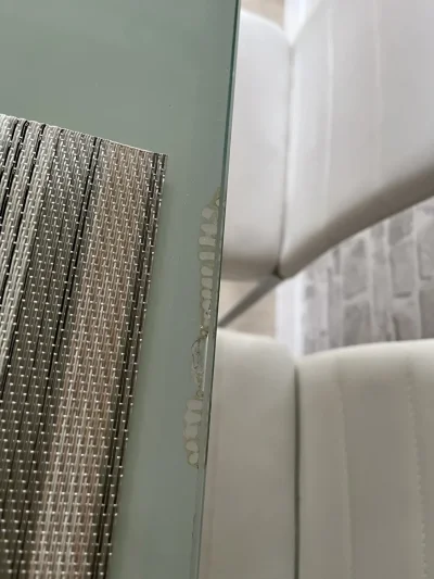 Modern Glass-Top Dining Table with White Chairs — image 5