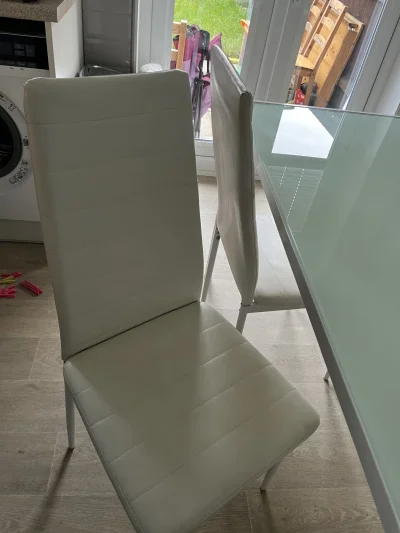 Modern Glass-Top Dining Table with White Chairs — image 8