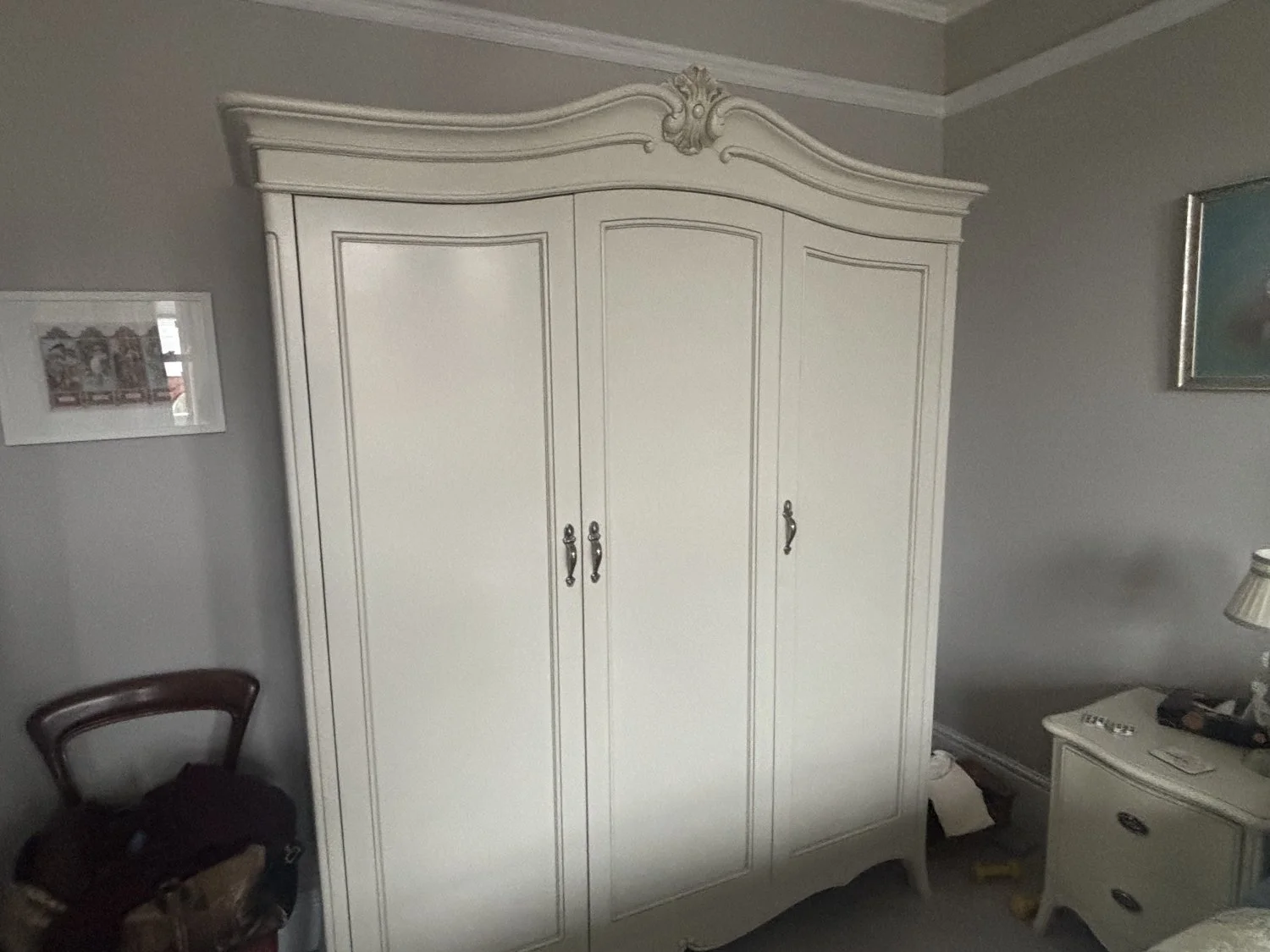 Elegant Wardrobe with Ornate Detailing
