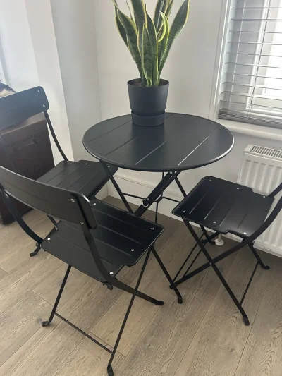 Stylish Modern Bistro Table and Folding Chairs Set in Sleek Black