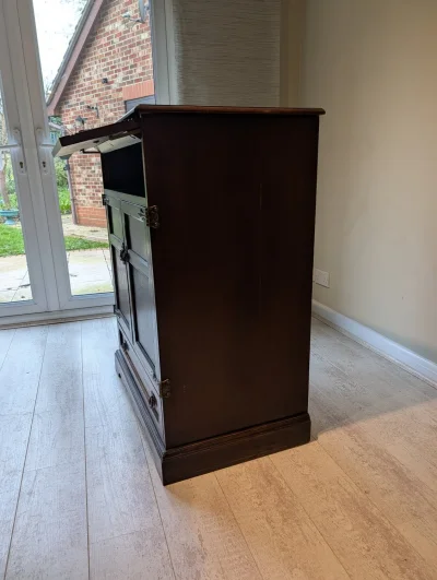 Vintage Wooden Cabinet with Drop-Down Top and Intricate Hardware — image 3