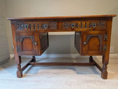 Vintage Carved Oak Desk with Leather Inlay and Decorative Hardware — image 2