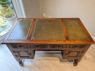 Vintage Carved Oak Desk with Leather Inlay and Decorative Hardware — image 5