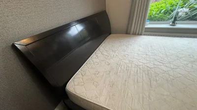 King-size bed with mattress and two side tables — image 3