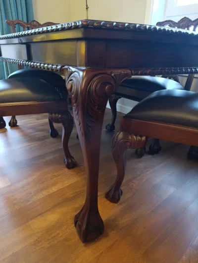 Chippendale-style dining set of an extendable table and four carved chairs — image 4