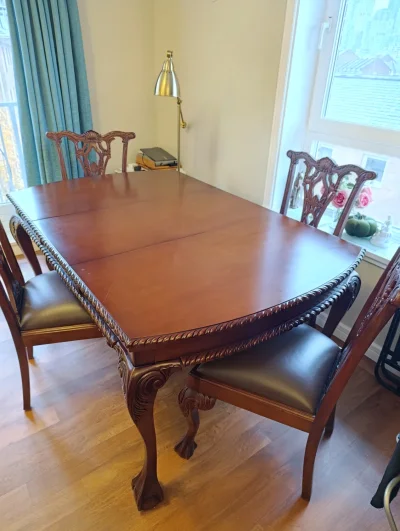 Chippendale-style dining set of an extendable table and four carved chairs — image 8