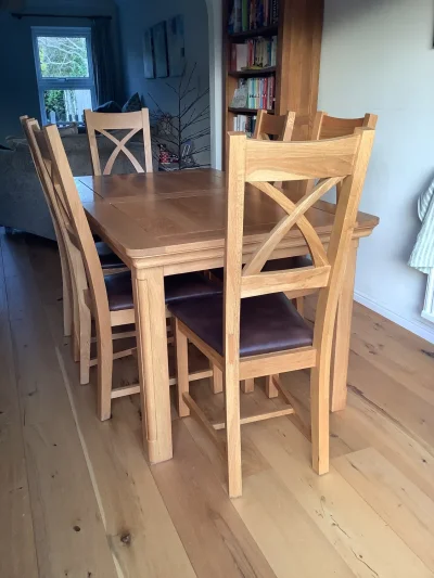 Solid oak 5ft x 3ft extending dining table + 6 cross back chairs with faux leather seats on Furnish Well