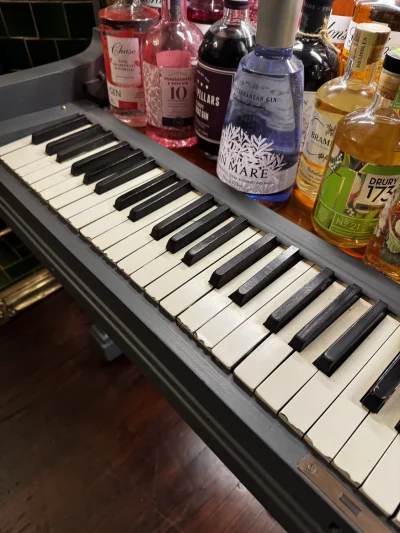 Vintage bar cabinet repurposed from a piano — image 6