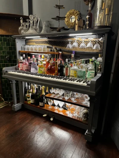 Vintage bar cabinet repurposed from a piano — image 7