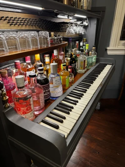 Vintage bar cabinet repurposed from a piano — image 3