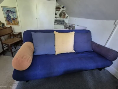 Blue futon sofabed with cushions on Furnish Well