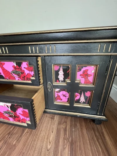 Vintage black storage cabinet with decorative panels — image 8