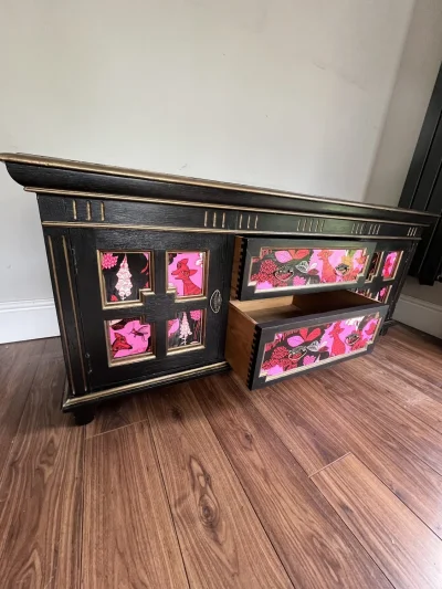 Vintage black storage cabinet with decorative panels — image 5