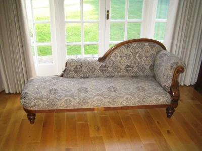Antique chaise longue with intricate upholstery — image 4