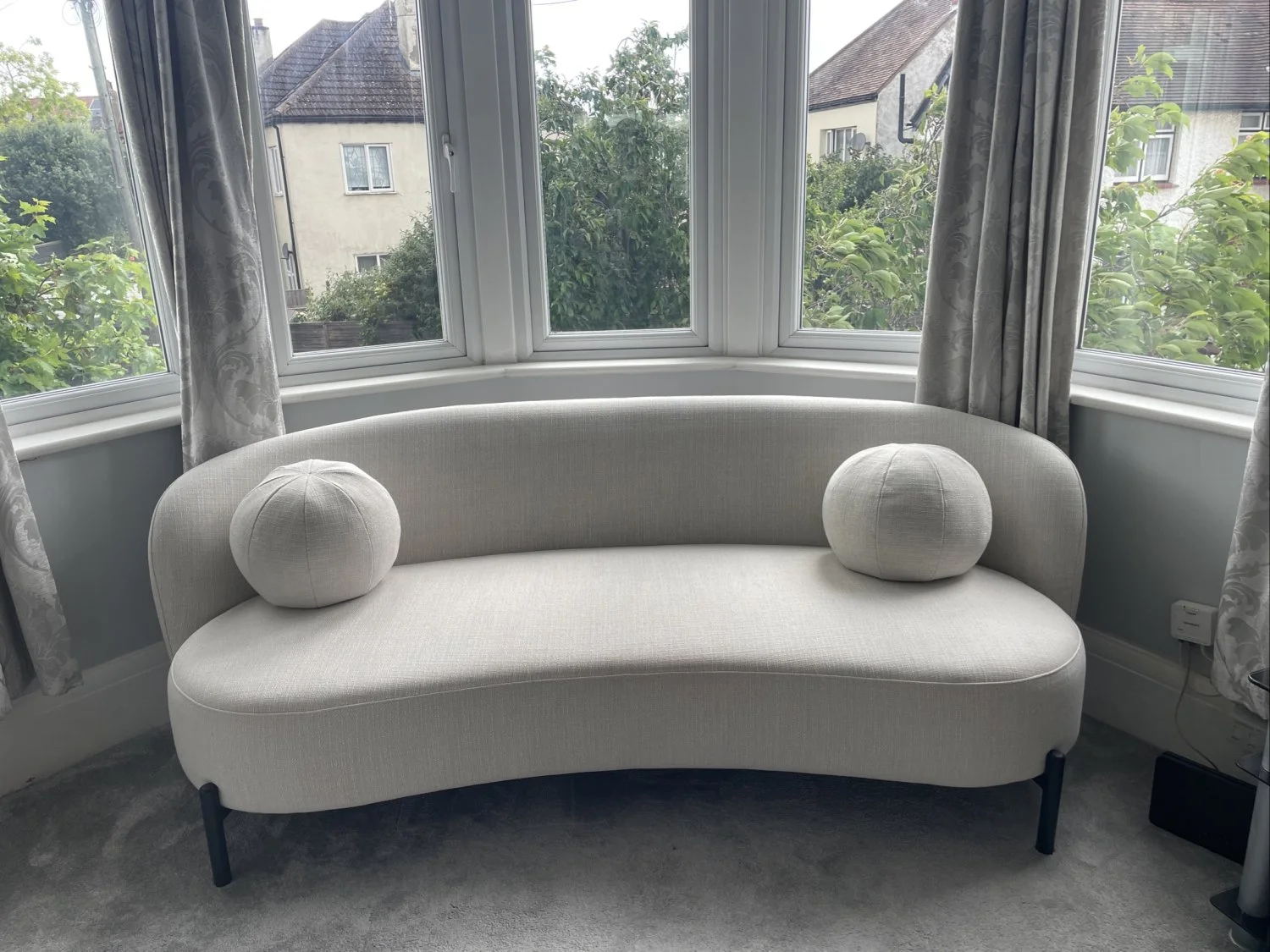 Daals Curved two-seater fabric sofa in light grey