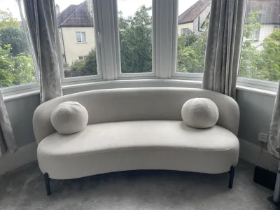 Daals Curved two-seater fabric sofa in light grey on Furnish Well