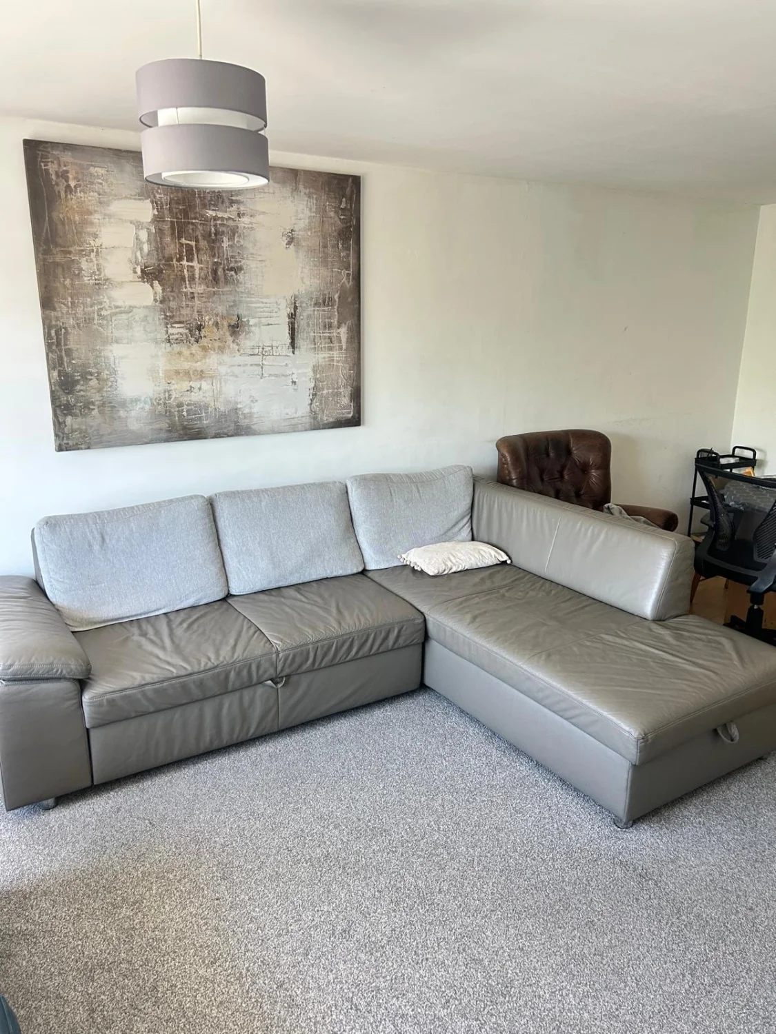L-shaped Sofa with pull out bed and storage