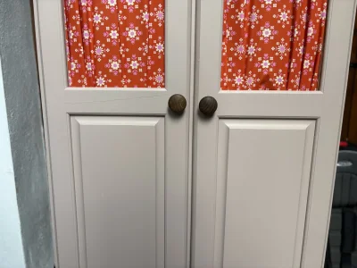 Two-door wardrobe with floral fabric panels — image 5