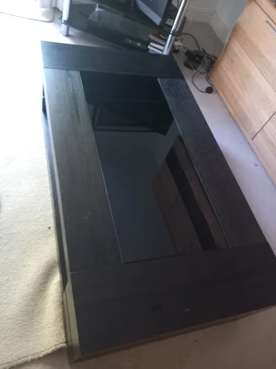 Large black rectangular coffee table with glass inset on Furnish Well