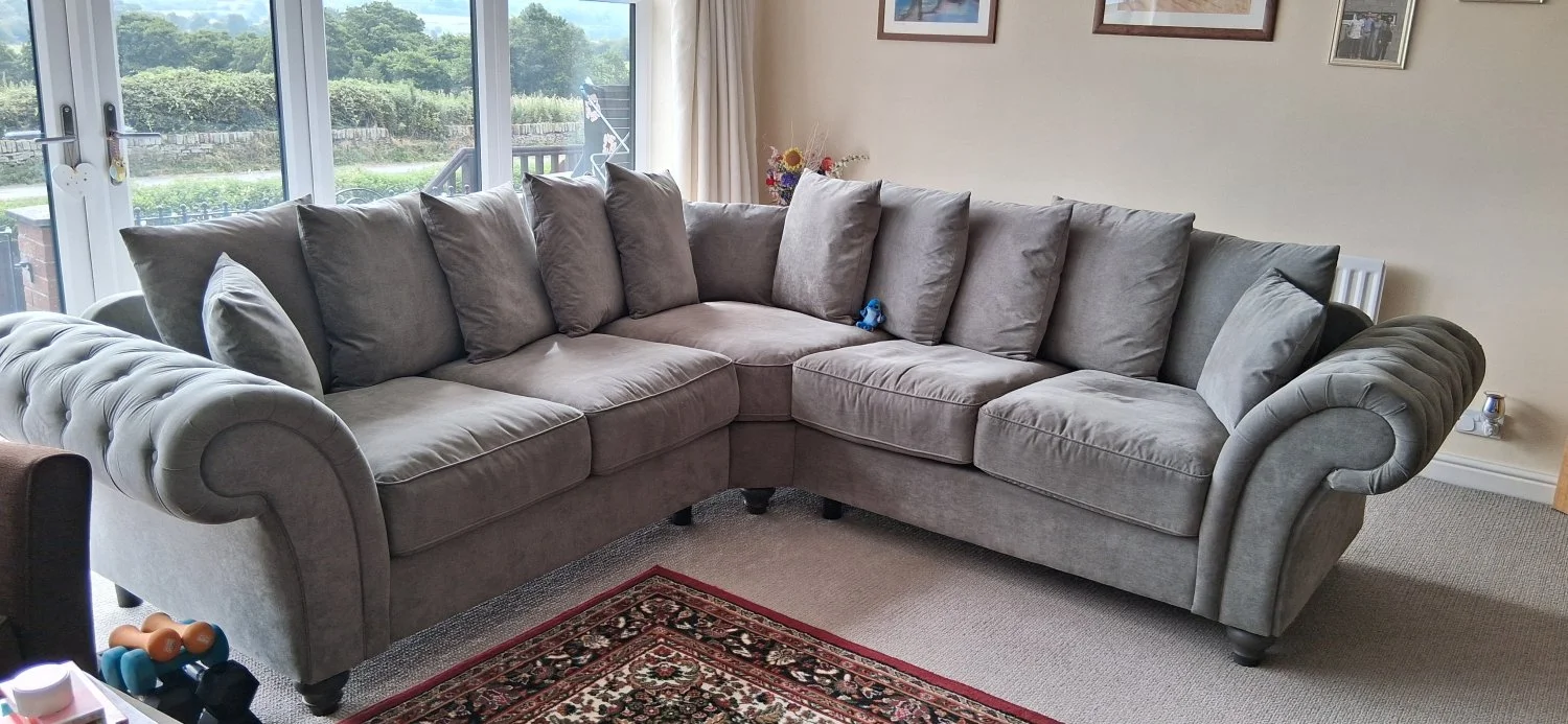 L-shaped fabric corner sofa in soft grey finish