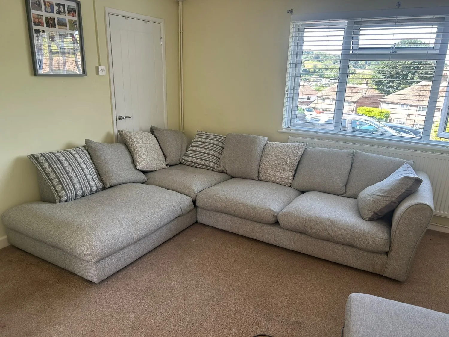 Large grey-taupe fabric corner sofa with left-hand chaise