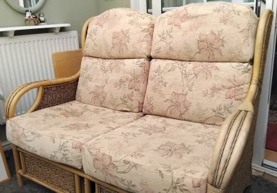 Bamboo Two-Seater Conservatory Sofa with Floral Cushions on Furnish Well