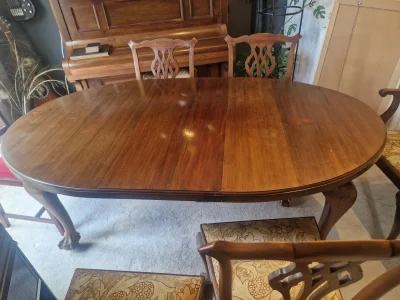 Beautiful traditional wooden extending dining table with 4 matching dining chairs and 1 carver chair on Furnish Well