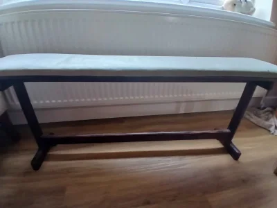 Vintage dark wood piano bench with pale upholstered seat on Furnish Well