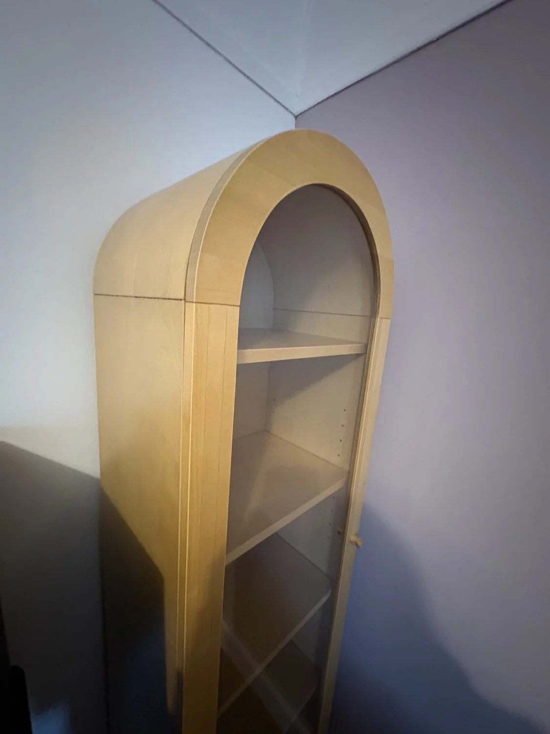 Tall arched glazed display cabinet in light beech-effect finish