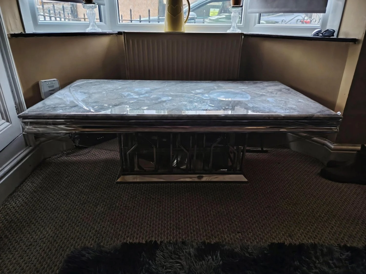 Contemporary Grey Marble-Style Coffee Table with Mirrored Pedestal Base