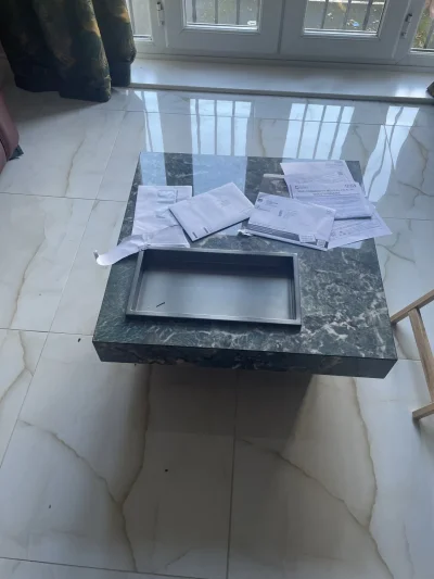 Modern dark marble-look coffee table with recessed metal tray on Furnish Well