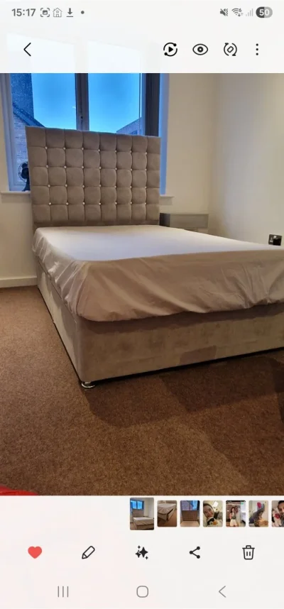 Grey upholstered storage divan bed with tall button-tufted headboard — image 3