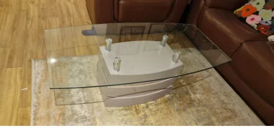 Modern rectangular glass-top coffee table with layered grey base — image 2