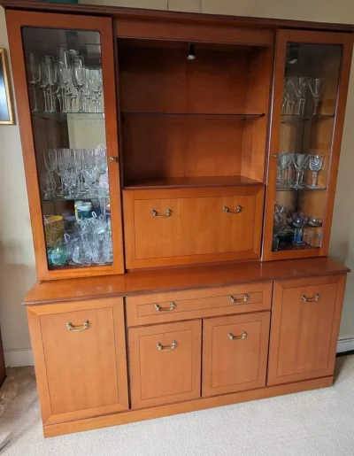 Vintage two-piece glazed display cabinet and sideboard in warm wood finish on Furnish Well