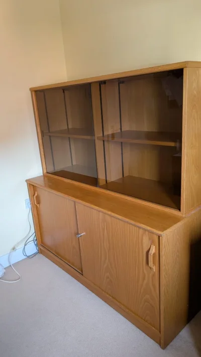 Vintage oak-tone display cabinet and sideboard hutch with sliding glass doors on Furnish Well