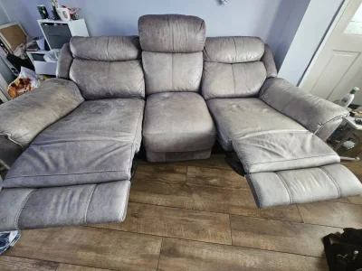 Grey three-seat power reclining sofa with USB charging port — image 6