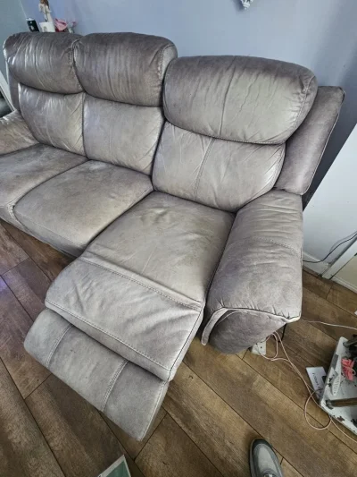 Grey three-seat power reclining sofa with USB charging port — image 3