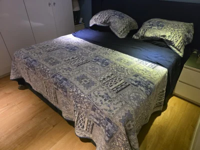 Dual electric adjustable divan bed with two mattresses and wired controls