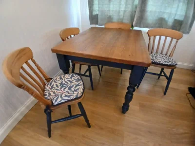 Vintage-style painted dining table and four spindle-back chairs on Furnish Well