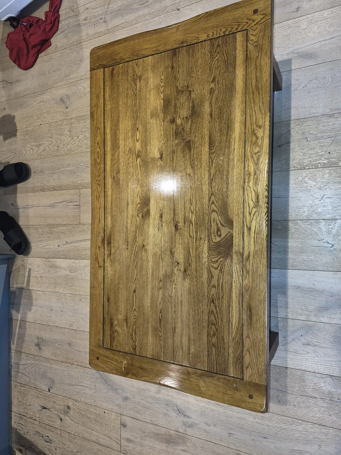 Vintage rustic oak coffee table with four drawers and dark metal handles