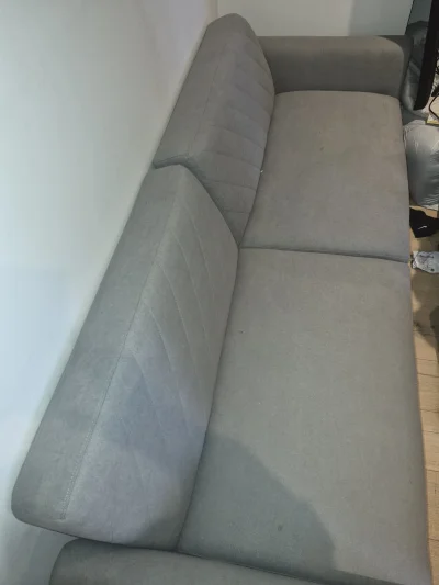Modern three-seat grey fabric sofa bed with stitched back cushions — image 3