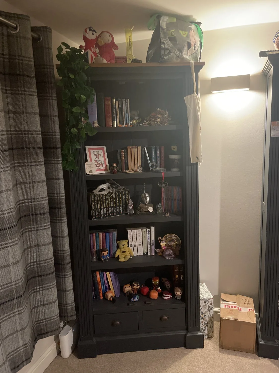 Matching dark painted bookcase, TV unit and side tables with brown oak tops