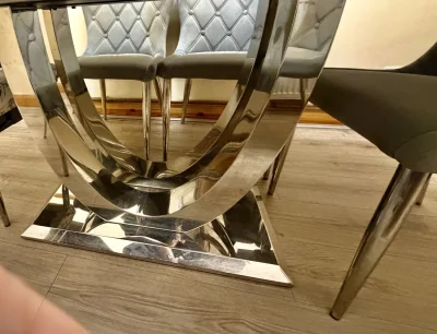 Contemporary grey marble-look dining table with six upholstered chairs — image 3