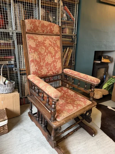 Vintage dark wood upholstered rocking armchair with floral fabric — image 2