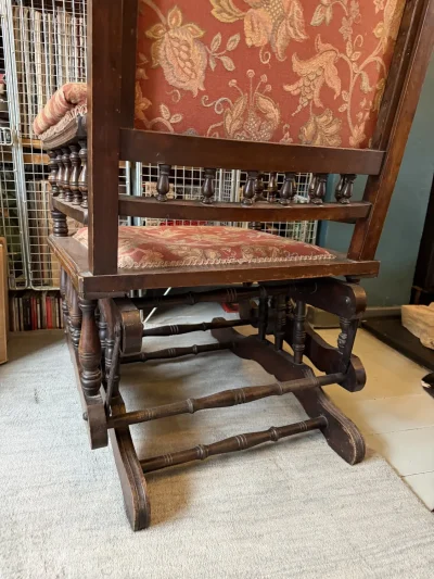 Vintage dark wood upholstered rocking armchair with floral fabric — image 7