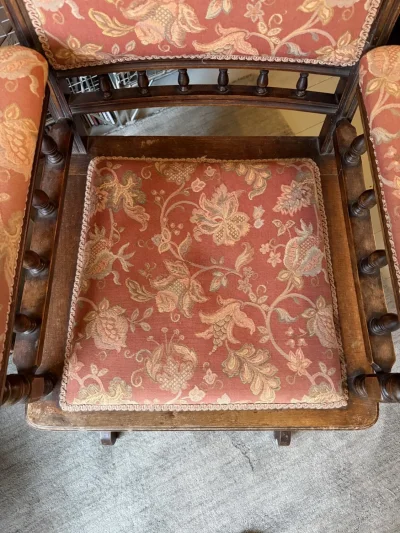 Vintage dark wood upholstered rocking armchair with floral fabric — image 9