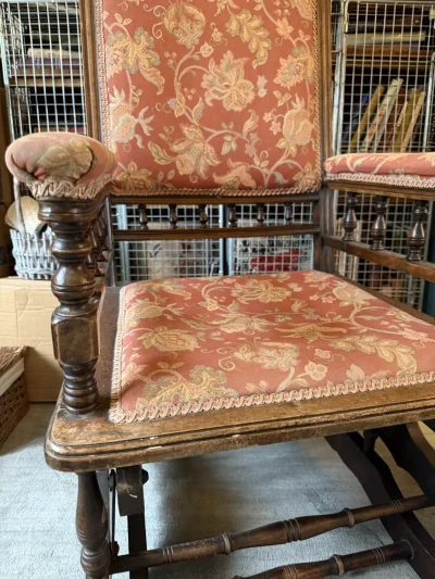 Vintage dark wood upholstered rocking armchair with floral fabric — image 4